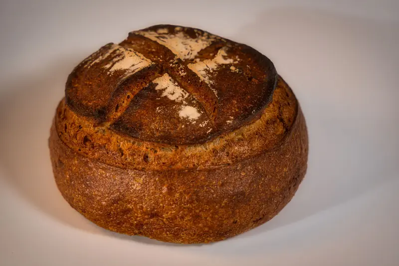 A beautifully crafted artisan bread loaf showcasing traditional baking in a Berlin bakery
